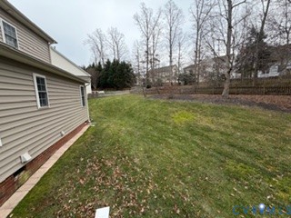 1406 Lundy Terrace Midlothian, VA 23114 - Photo 34 of 37 a view of a backyard with pathway