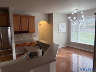 1406 Lundy Terrace Midlothian, VA 23114 - Photo 8 of 37 a bathroom with a sink a large mirror and a shower