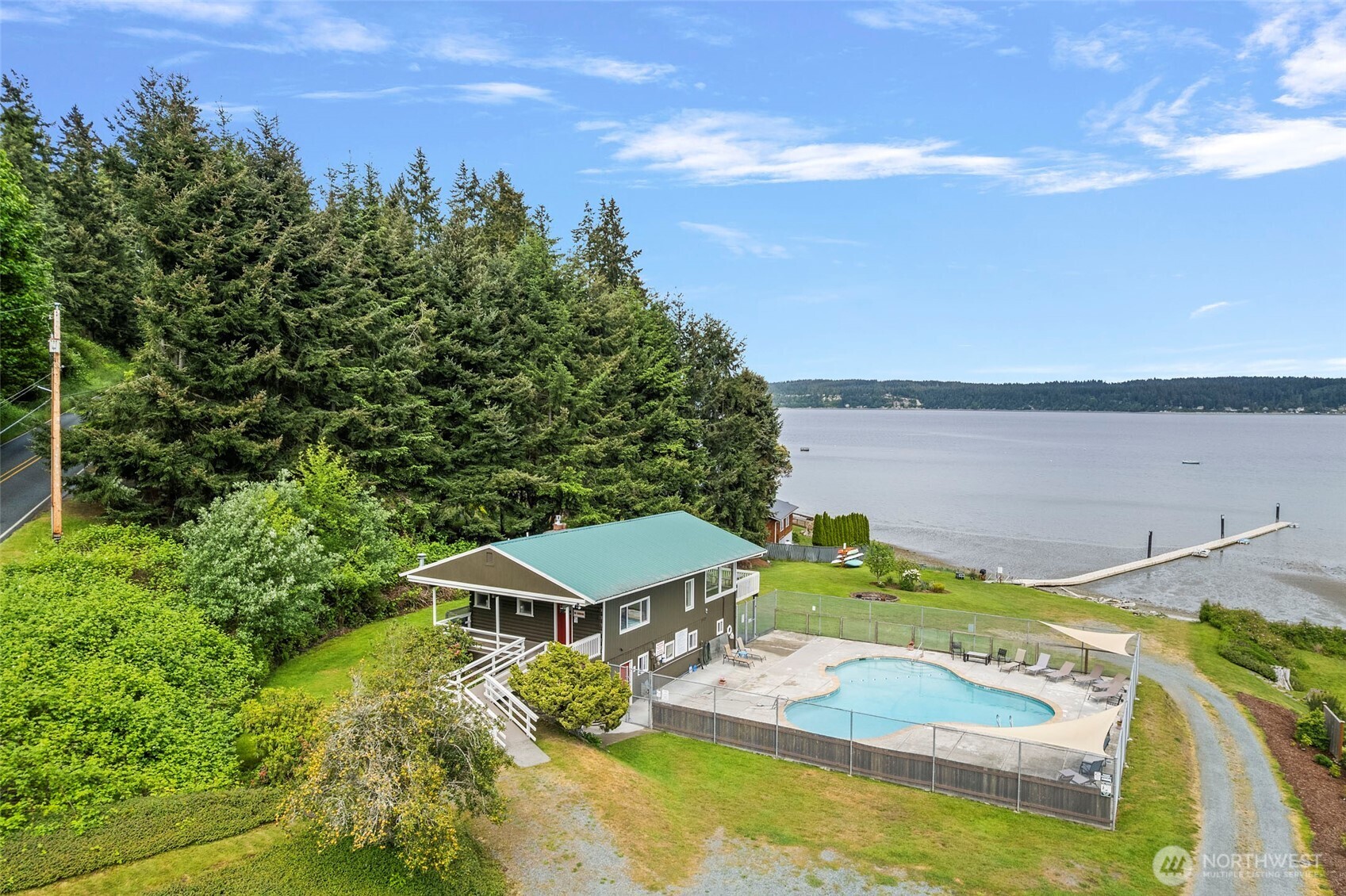 0 Minor Way Greenbank, WA 98253 - Photo 11 of 13 a view of a house with a lake view