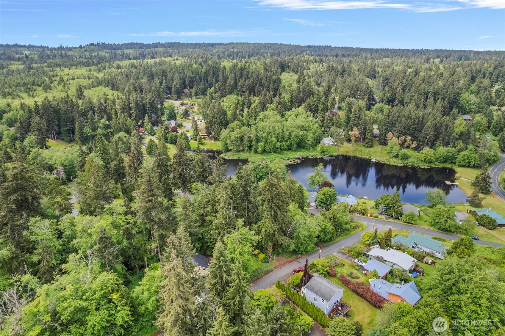 0 Minor Way Greenbank, WA 98253 - Photo 2 of 13 an aerial view of residential house with outdoor space and trees all around