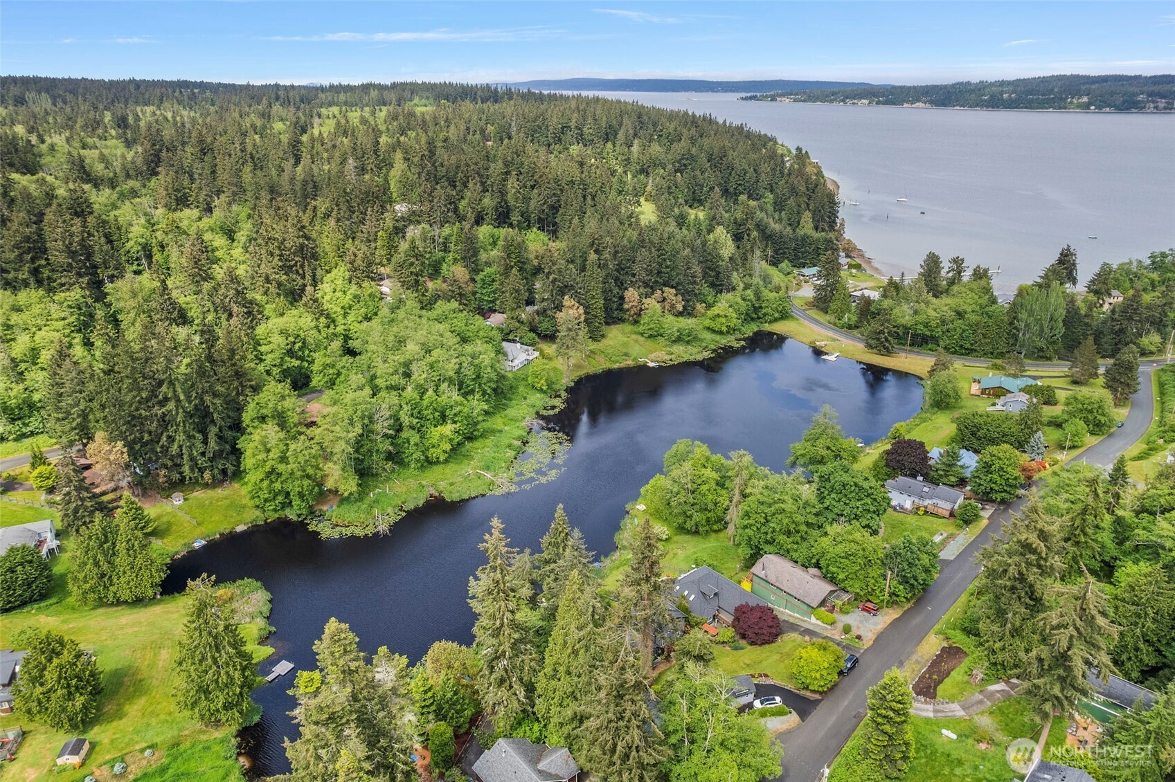 0 Minor Way Greenbank, WA 98253 - Photo 9 of 13 an aerial view of a yard with plants and lake view