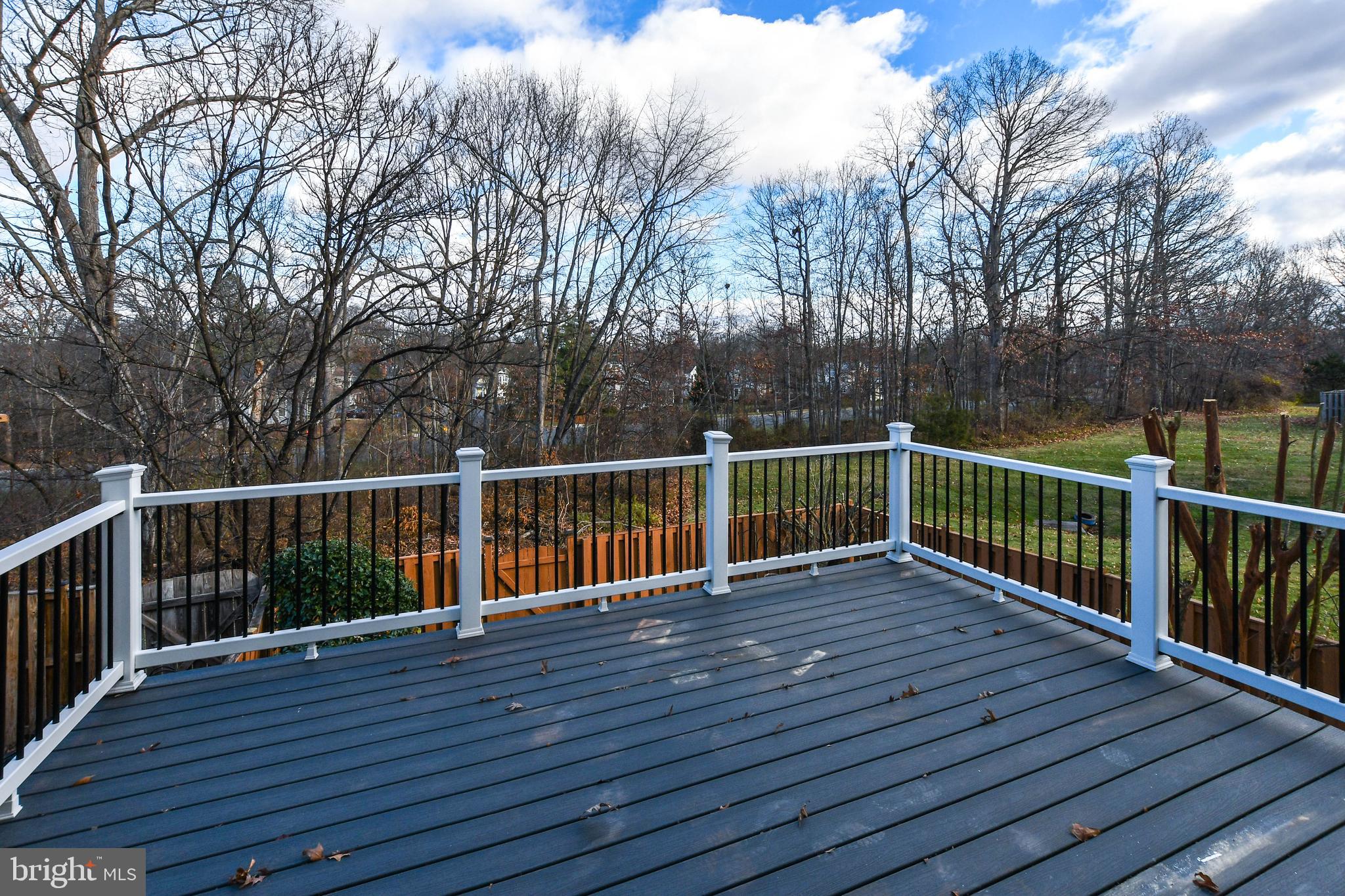 9 Dorrell Court Sterling, VA 20165 - Photo 14 of 36 a view of deck with wooden floor and fence