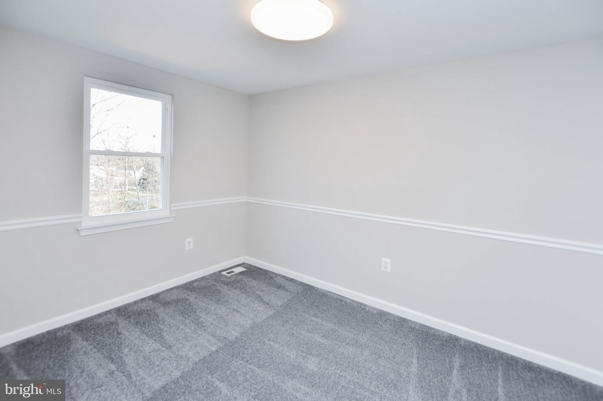 9 Dorrell Court Sterling, VA 20165 - Photo 22 of 36 an empty room with a window