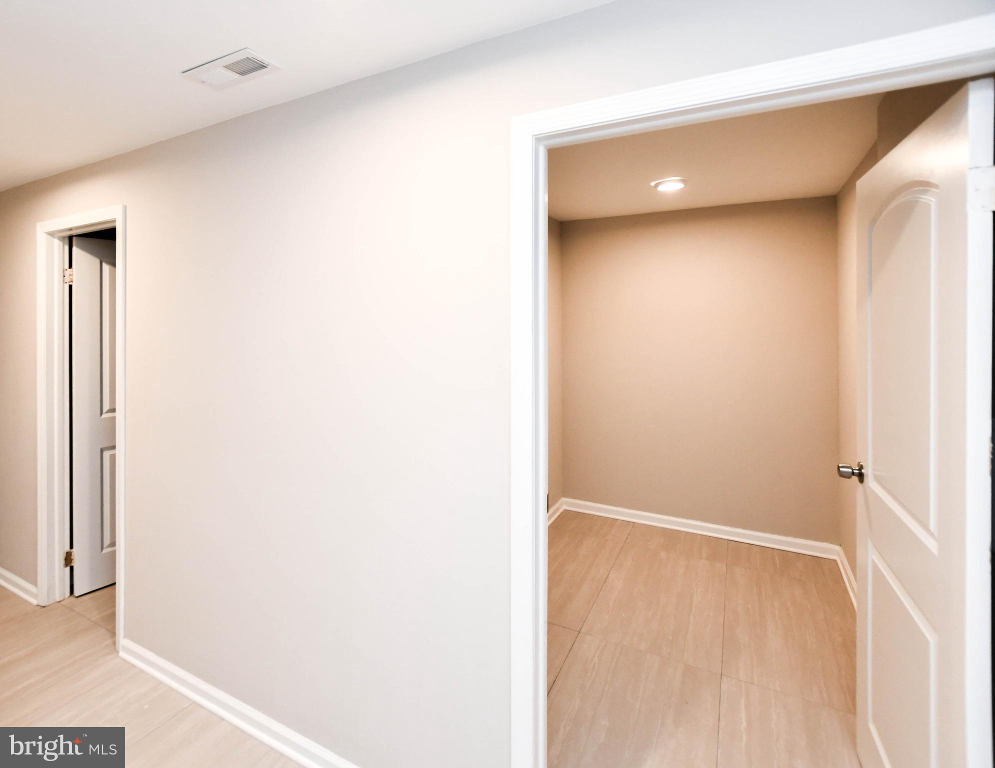 9 Dorrell Court Sterling, VA 20165 - Photo 29 of 36 a bathroom with a shower