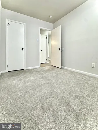 an empty room with an entryway