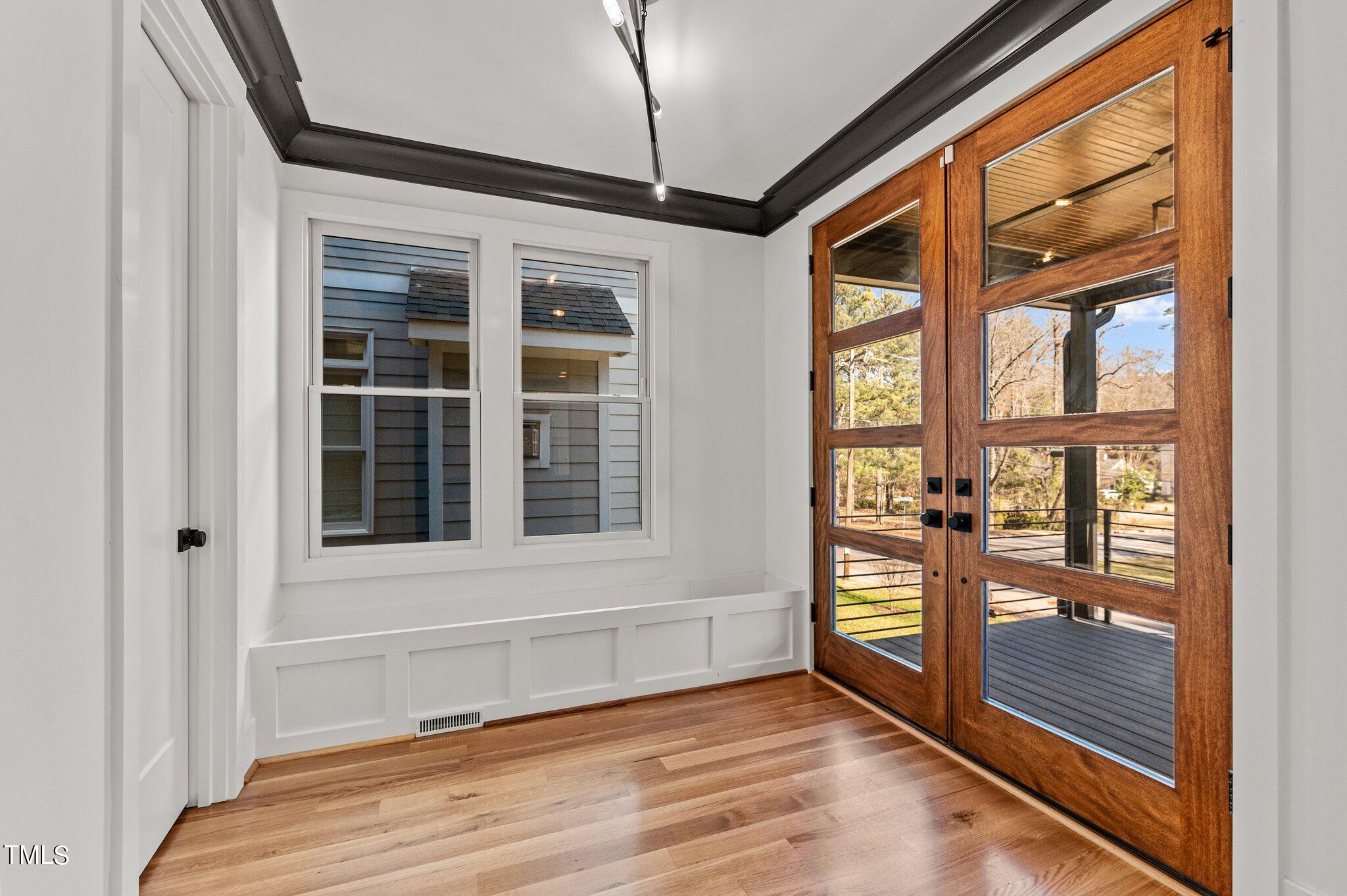 1437 Nottingham Road Raleigh, NC 27607 - Photo 11 of 61 a view of an empty room with a window