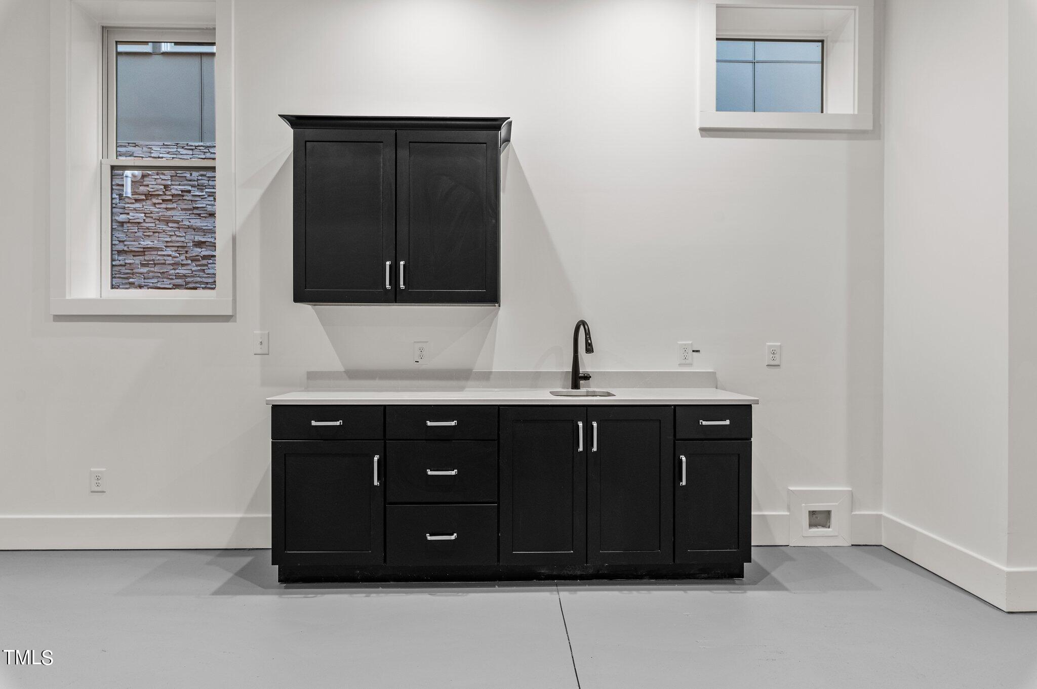 1437 Nottingham Road Raleigh, NC 27607 - Photo 28 of 61 a bathroom with a sink vanity and mirror