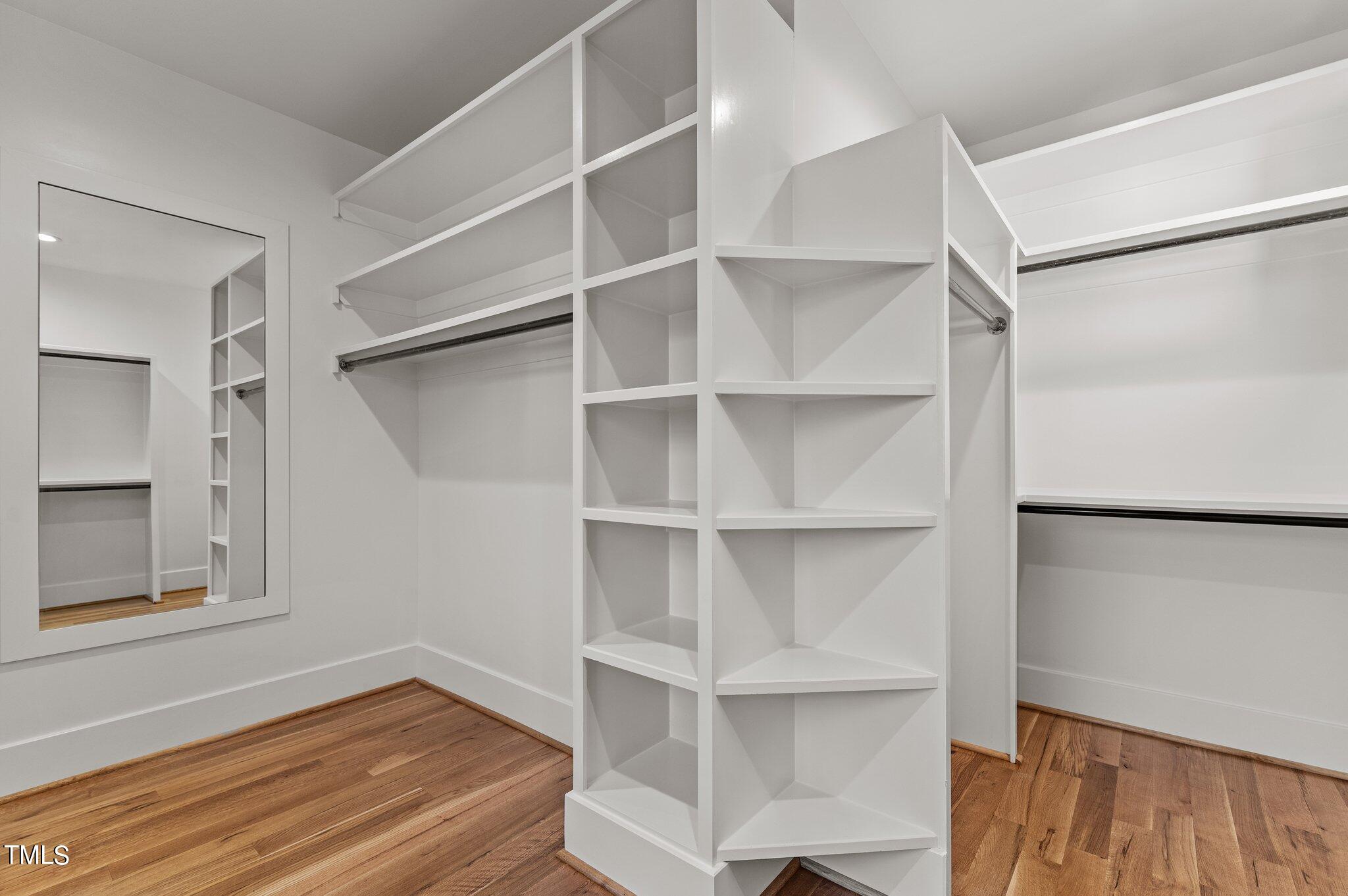 1437 Nottingham Road Raleigh, NC 27607 - Photo 35 of 61 a view of walk in closet with empty racks