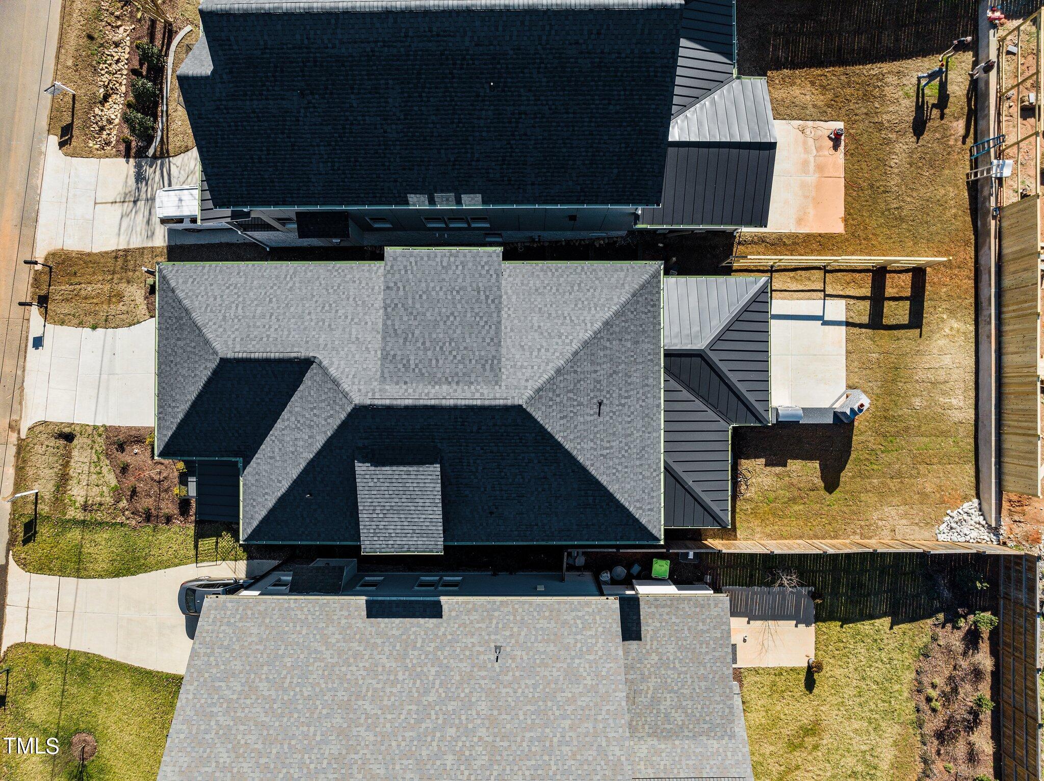 1437 Nottingham Road Raleigh, NC 27607 - Photo 60 of 61 an aerial view of residential houses with outdoor space