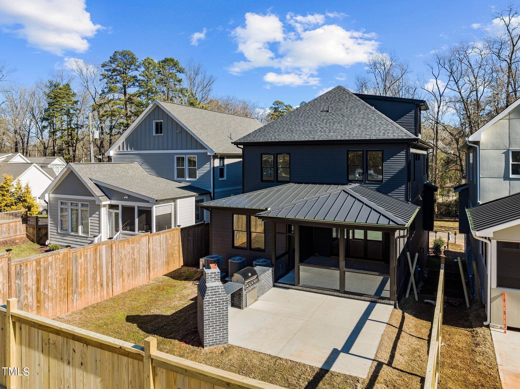1437 Nottingham Road Raleigh, NC 27607 - Photo 7 of 61 a front view of a house with a yard
