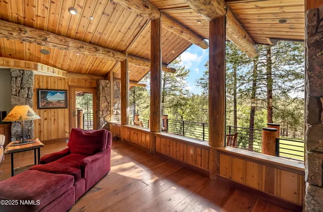 a spacious bathroom with a double vanity sink a mirror and a bathtub