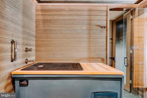 a bathroom with a sink and a shower