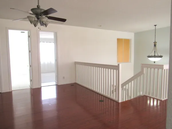a view of a livingroom with a hardwood floor