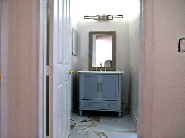 a view of cabinets and utility room