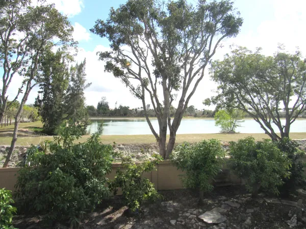 a view of lake with a house