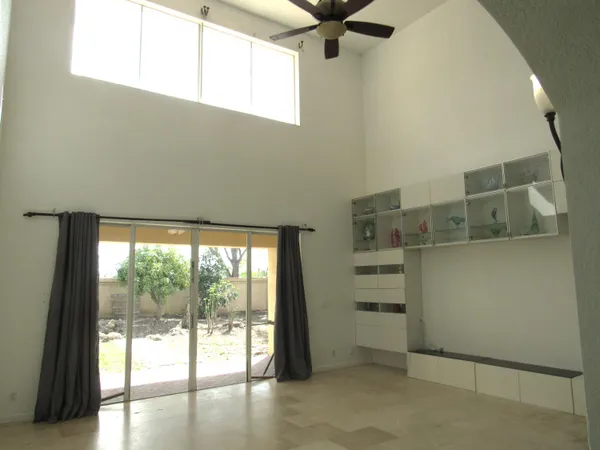 a view of an empty room and window