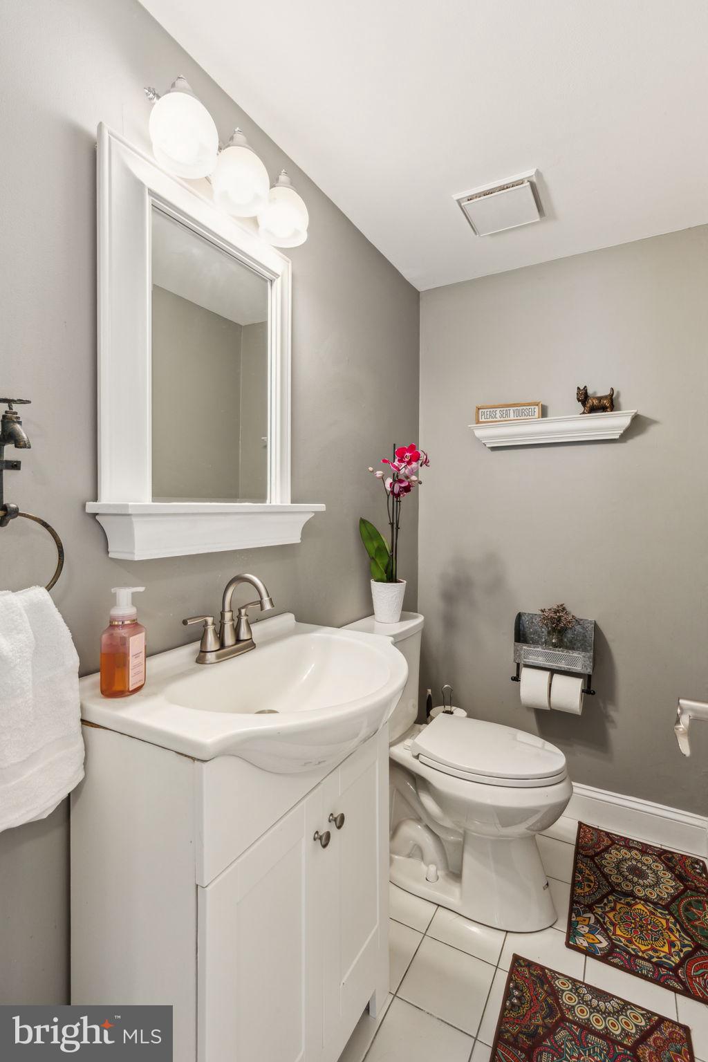 25 Wallingford Way Shamong, NJ 08088 - Photo 32 of 65 a bathroom with a toilet sink and mirror