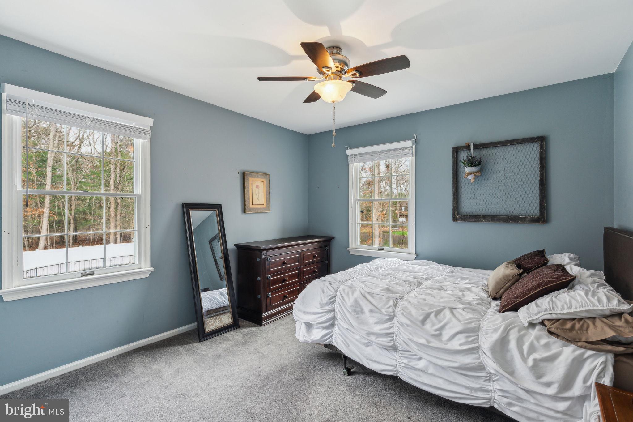 25 Wallingford Way Shamong, NJ 08088 - Photo 37 of 65 a bedroom with a bed and a window