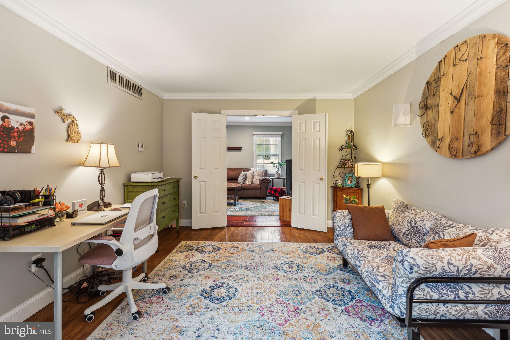 25 Wallingford Way Shamong, NJ 08088 - Photo 45 of 65 a living room with furniture and a wooden floor