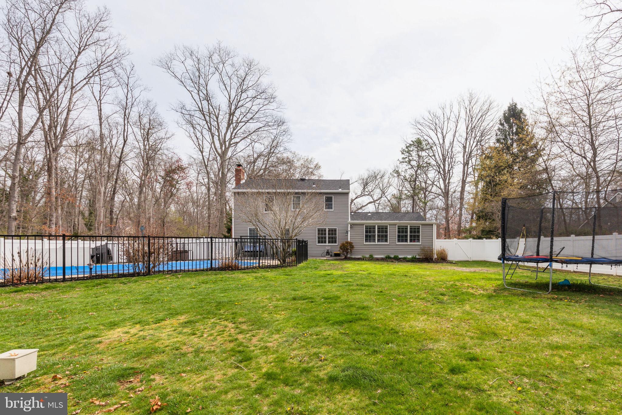 25 Wallingford Way Shamong, NJ 08088 - Photo 49 of 65 a view of a house with a big yard and large trees