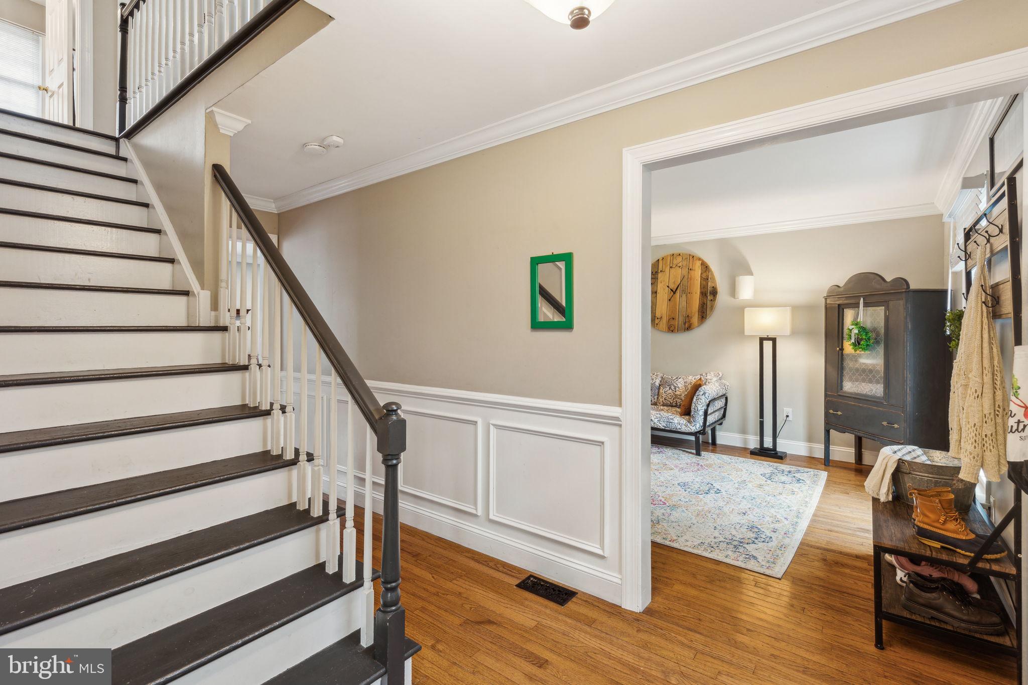 25 Wallingford Way Shamong, NJ 08088 - Photo 5 of 65 a view of a hallway with wooden floor and staircase