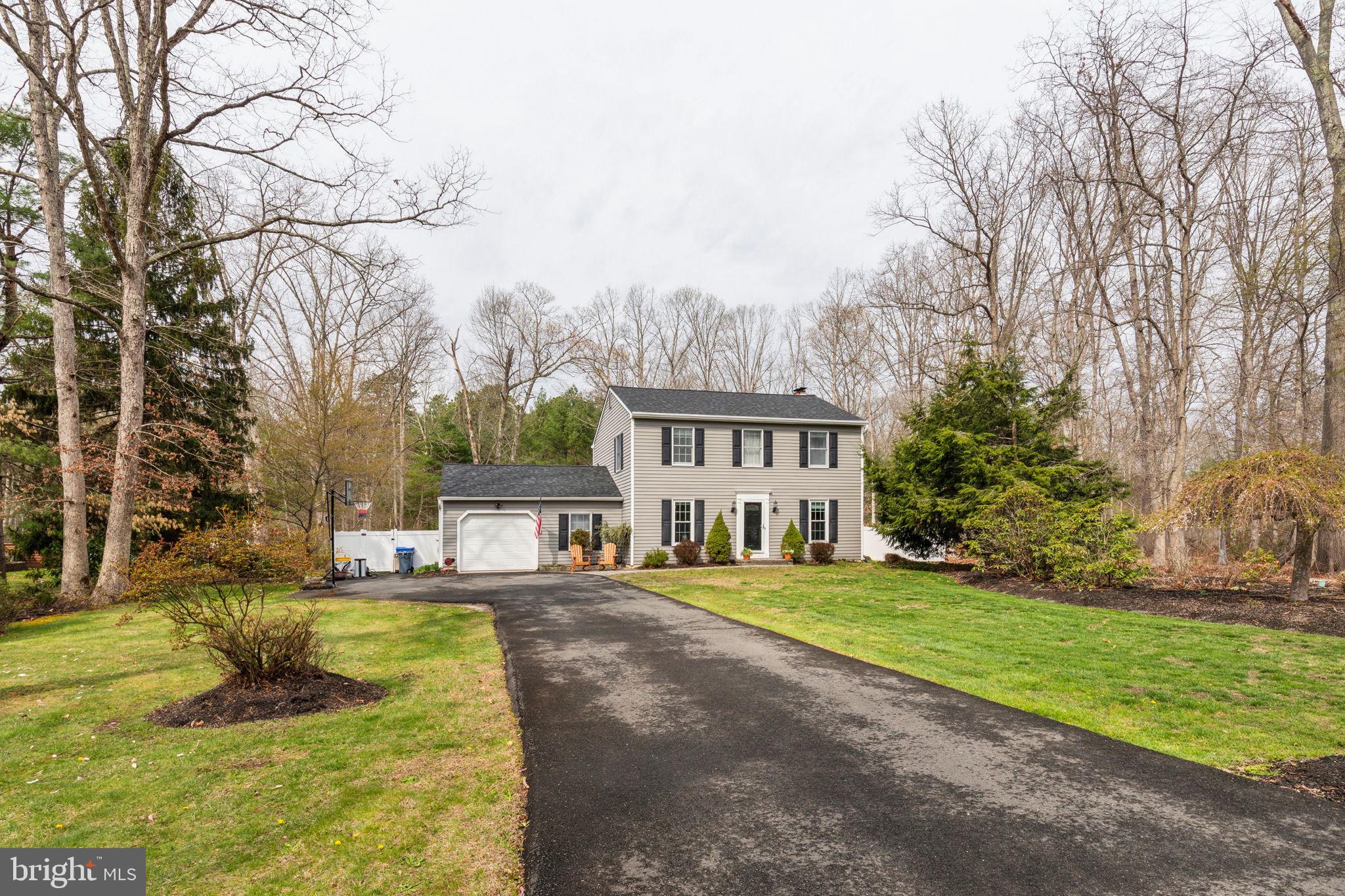 25 Wallingford Way Shamong, NJ 08088 - Photo 65 of 65 a view of a house with swimming pool and garden