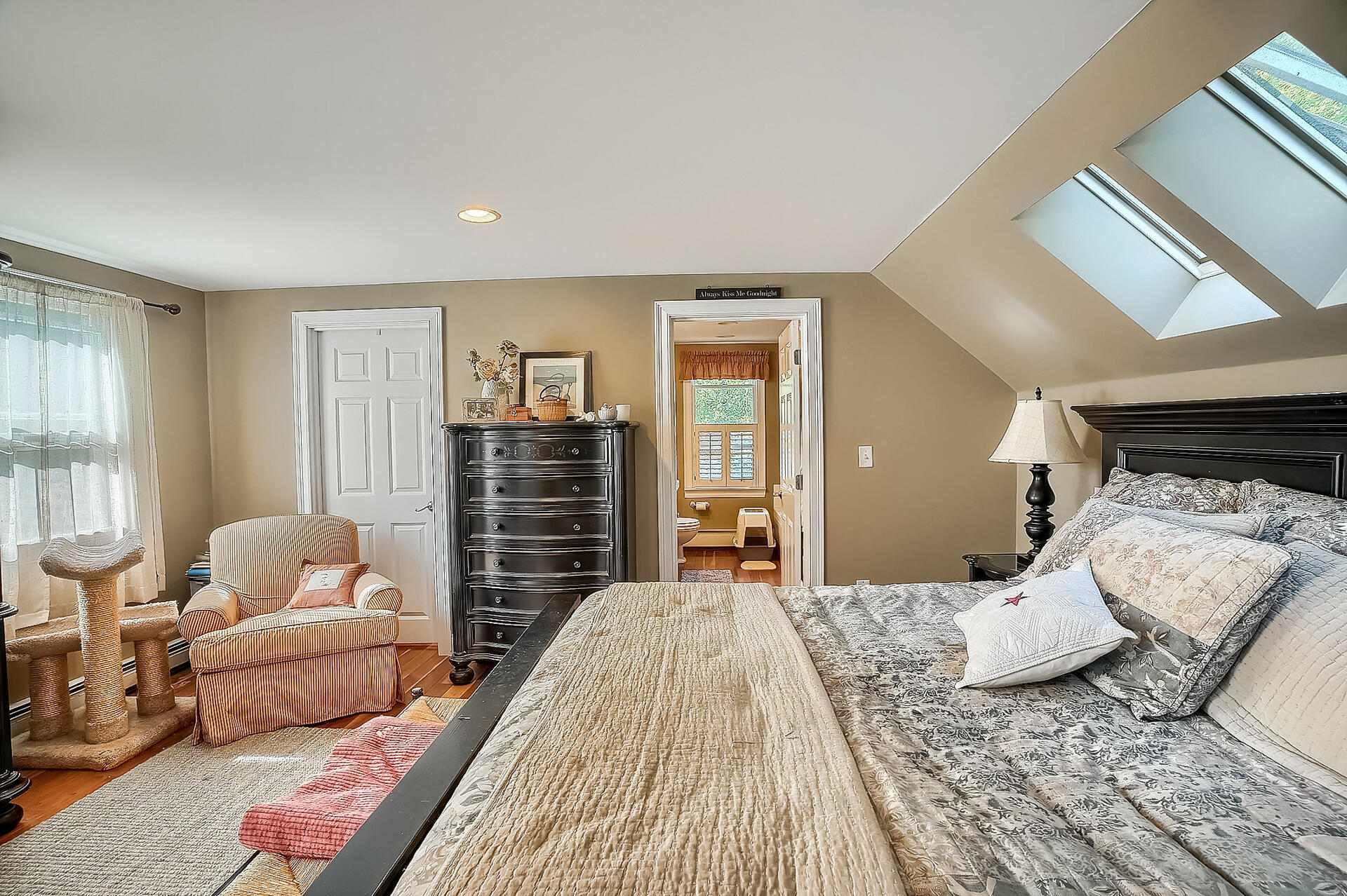 178 Main Street Orleans, MA 02653 - Photo 17 of 34 a bedroom with a bed and wooden floor