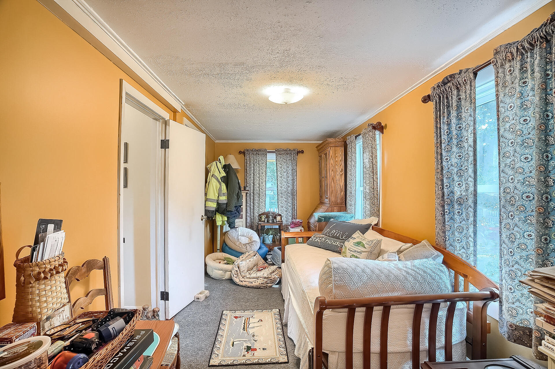 178 Main Street Orleans, MA 02653 - Photo 24 of 34 a bedroom with furniture and a window