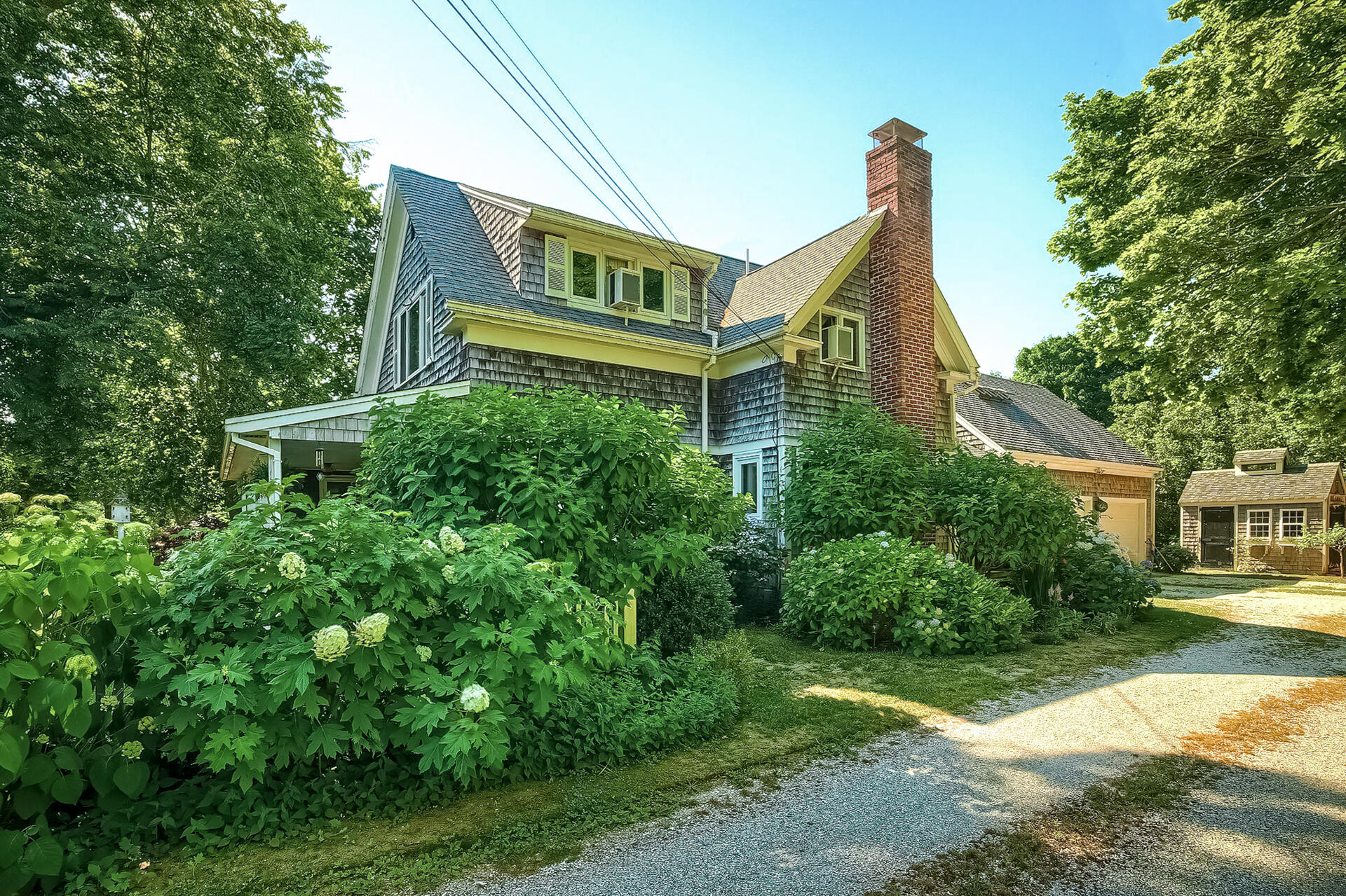 178 Main Street Orleans, MA 02653 - Photo 30 of 34 a front view of a house with a yard