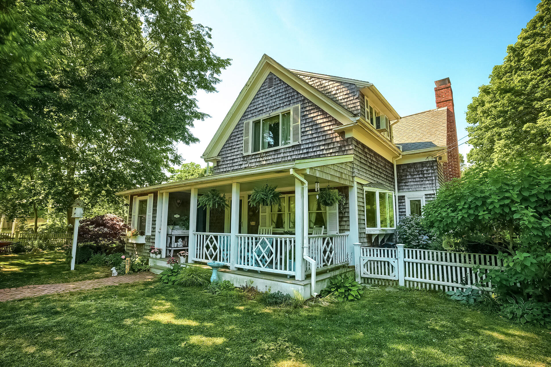 178 Main Street Orleans, MA 02653 - Photo 4 of 34 a view of a house with a yard and plants
