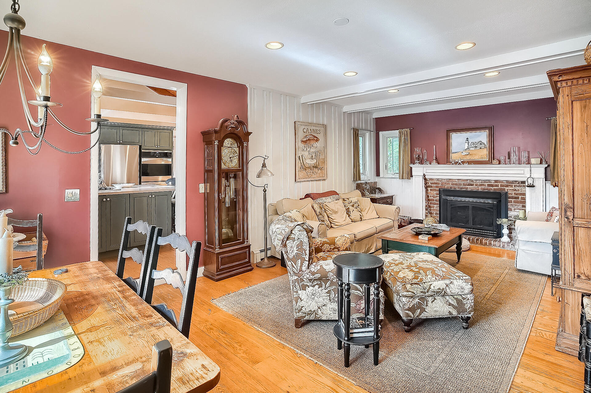 178 Main Street Orleans, MA 02653 - Photo 6 of 34 a living room with furniture and a fireplace