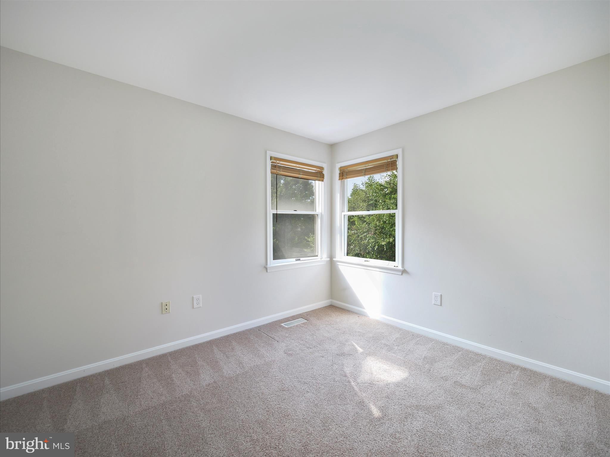 4614 Newington Road Jefferson, MD 21755 - Photo 19 of 35 an empty room with windows