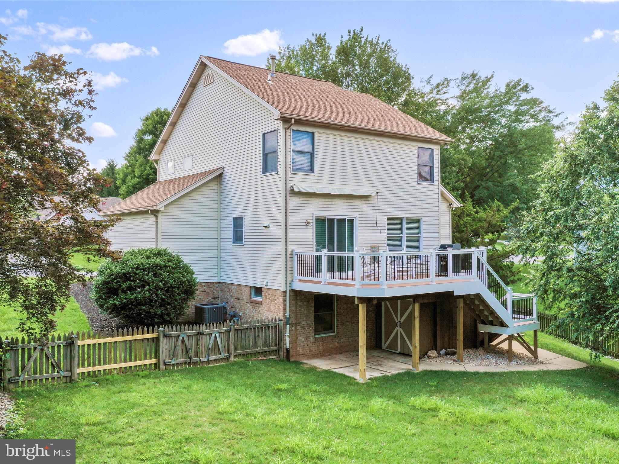 4614 Newington Road Jefferson, MD 21755 - Photo 28 of 35 a view of a house with a yard and sitting area