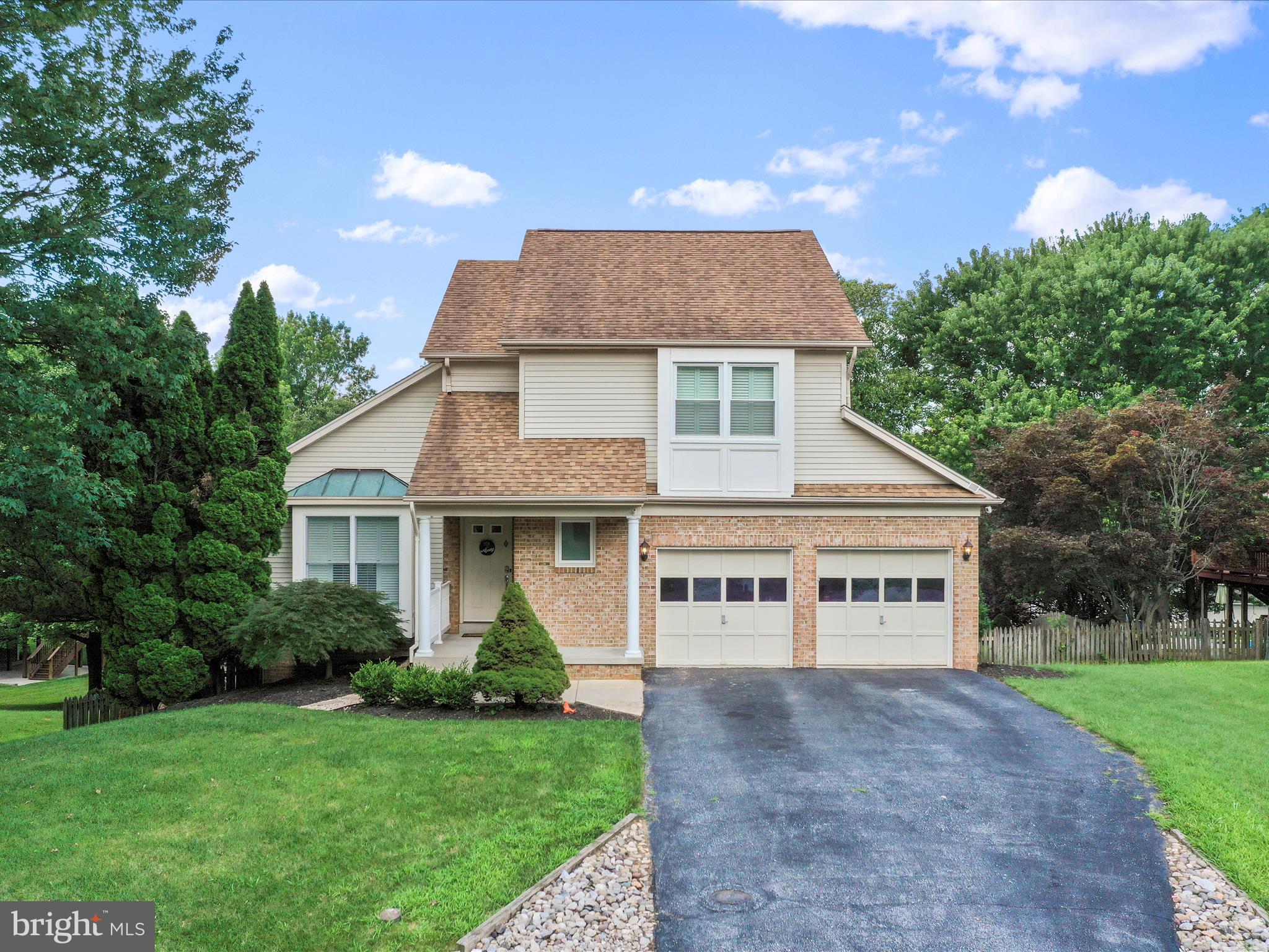 4614 Newington Road Jefferson, MD 21755 - Photo 3 of 35 a view of a house with a yard and plants