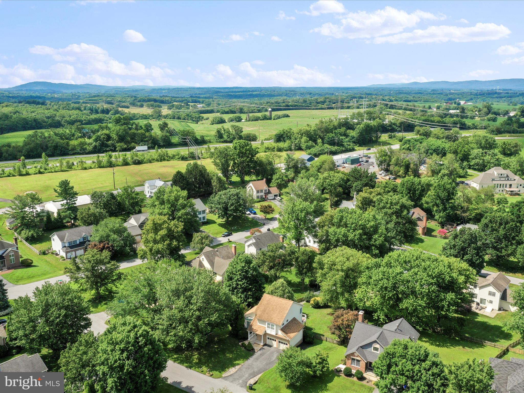 4614 Newington Road Jefferson, MD 21755 - Photo 34 of 35 a view of a city with green field