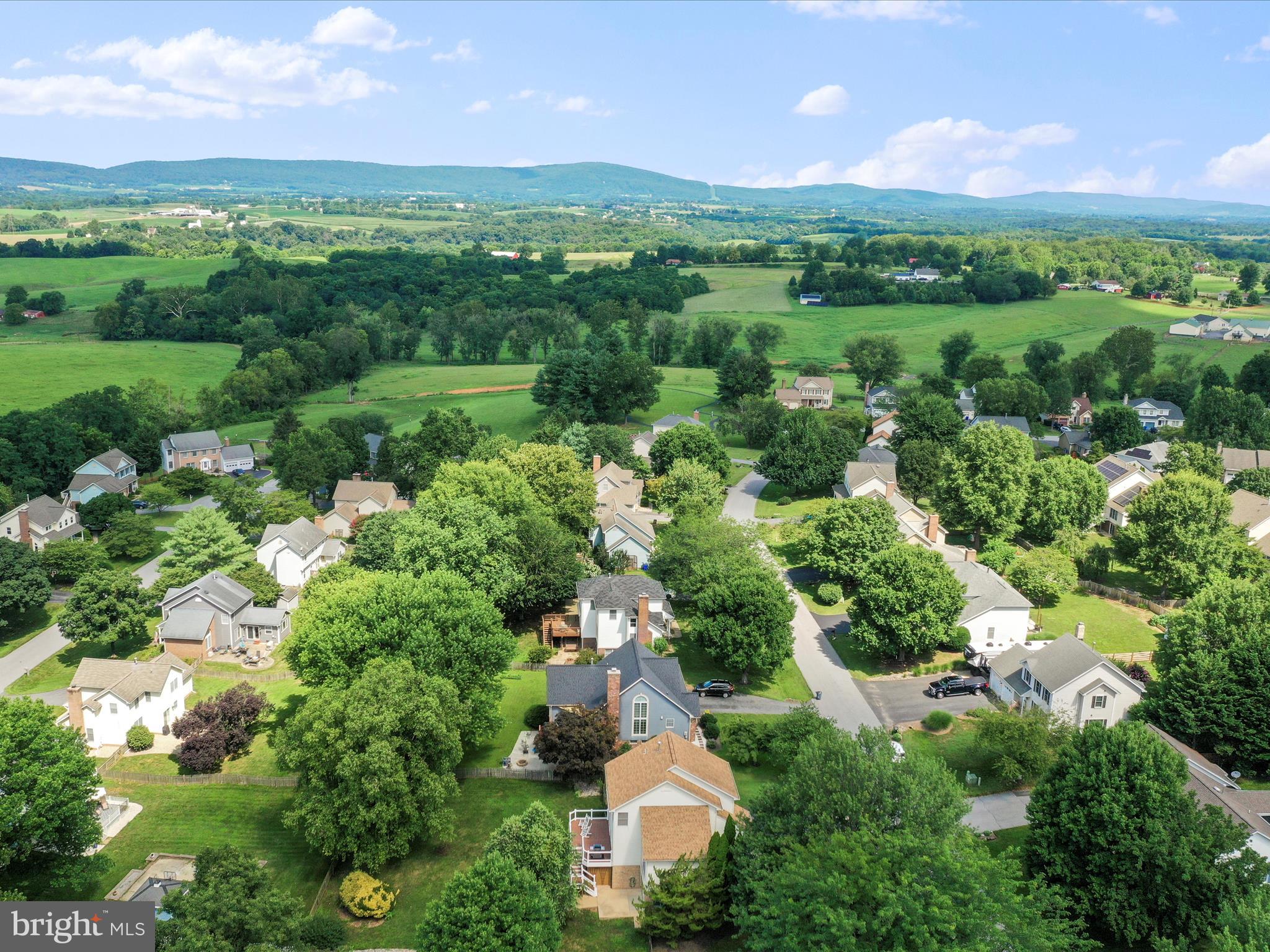 4614 Newington Road Jefferson, MD 21755 - Photo 35 of 35 an aerial view of a houses with outdoor space and a lake view