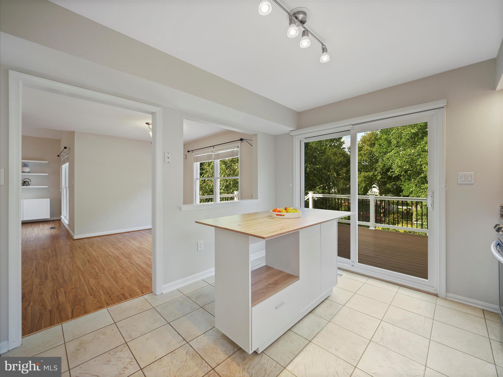 4614 Newington Road Jefferson, MD 21755 - Photo 7 of 35 a view of washer and dryer with kitchen view