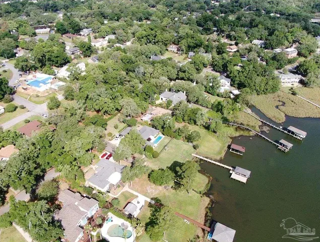 a view of outdoor space with trees all around