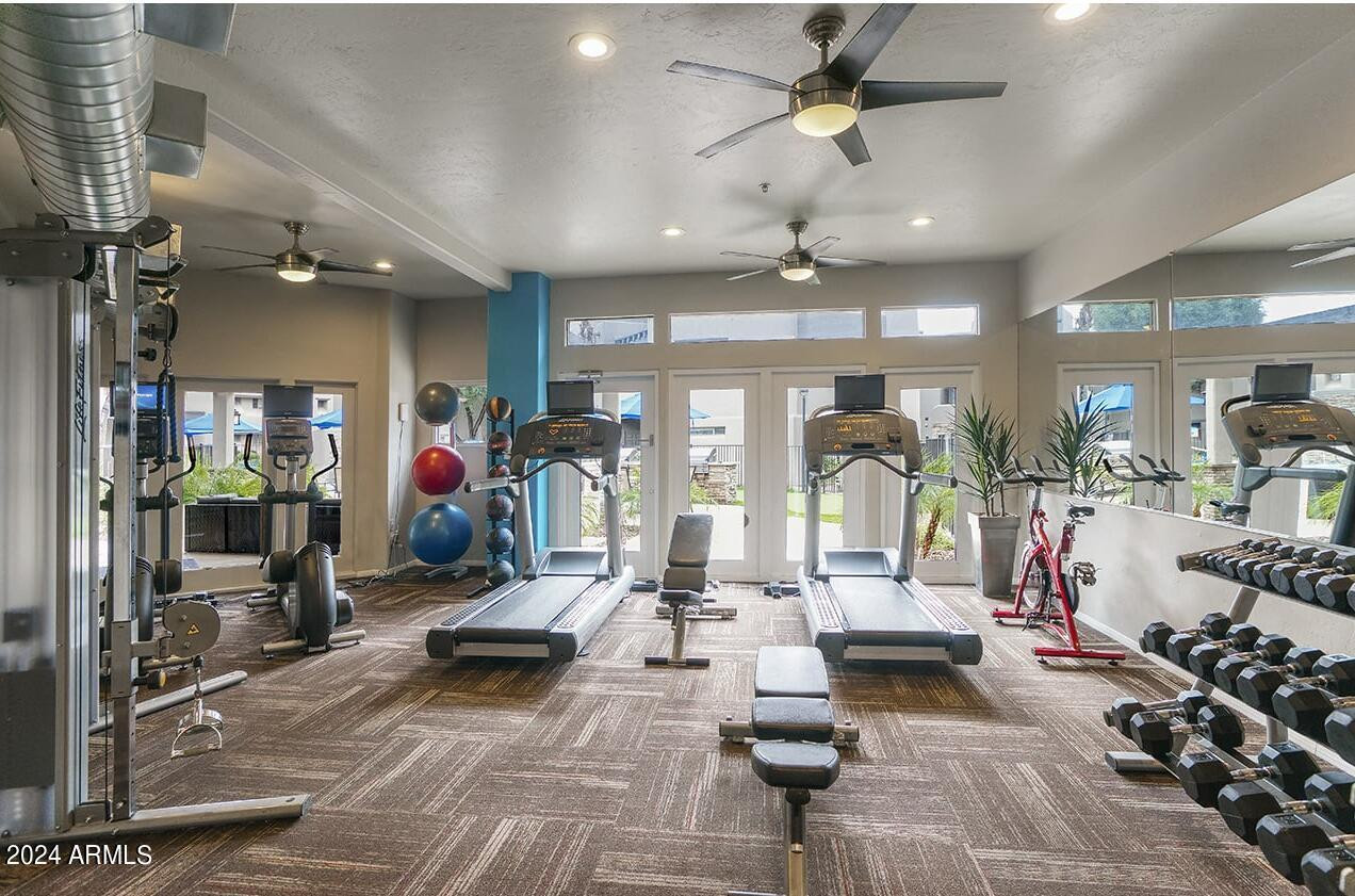9259 East Raintree Drive, Unit 1 Scottsdale, AZ 85260 - Photo 8 of 15 a view of a room with gym equipment