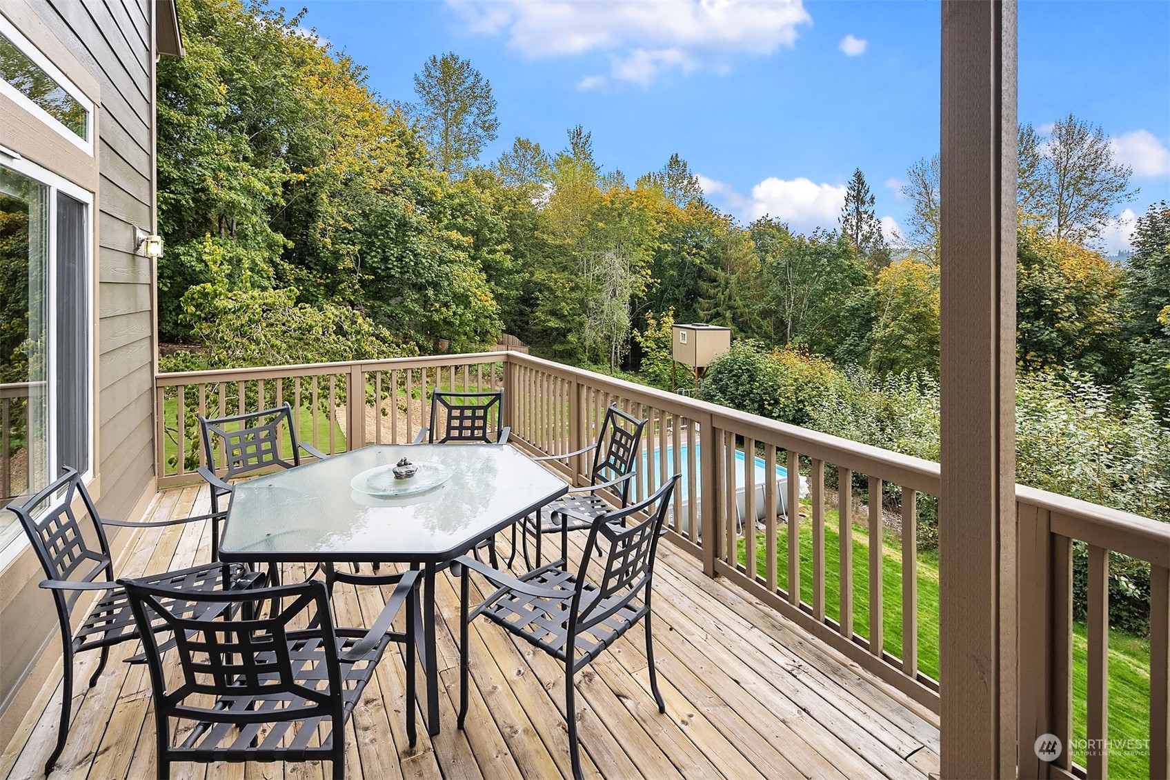 32255 Northeast 88th Street Carnation, WA 98014 - Photo 19 of 40 a view of a balcony with furniture