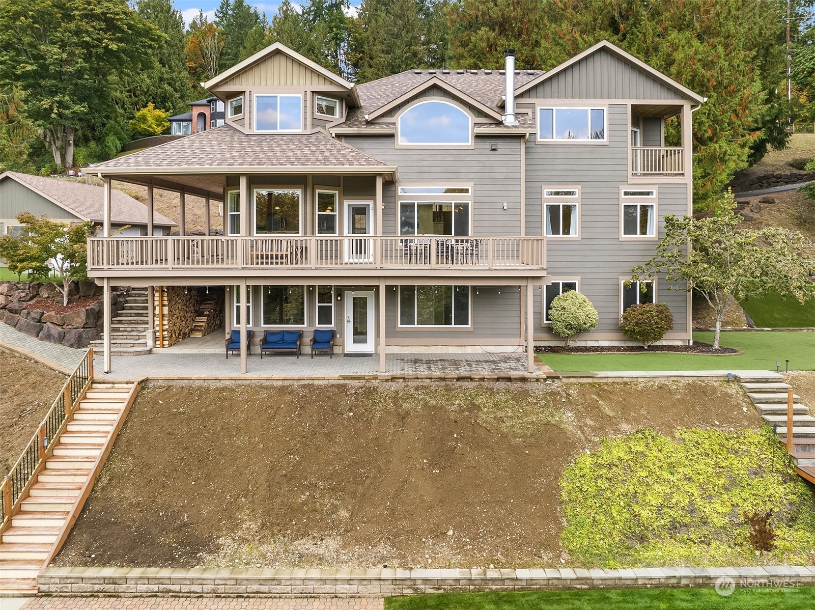 32255 Northeast 88th Street Carnation, WA 98014 - Photo 36 of 40 a front view of a house with a garden