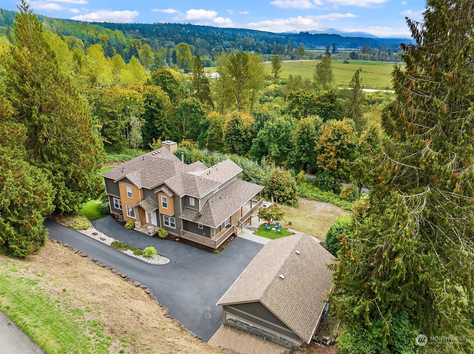 32255 Northeast 88th Street Carnation, WA 98014 - Photo 40 of 40 a view of a swimming pool with a yard