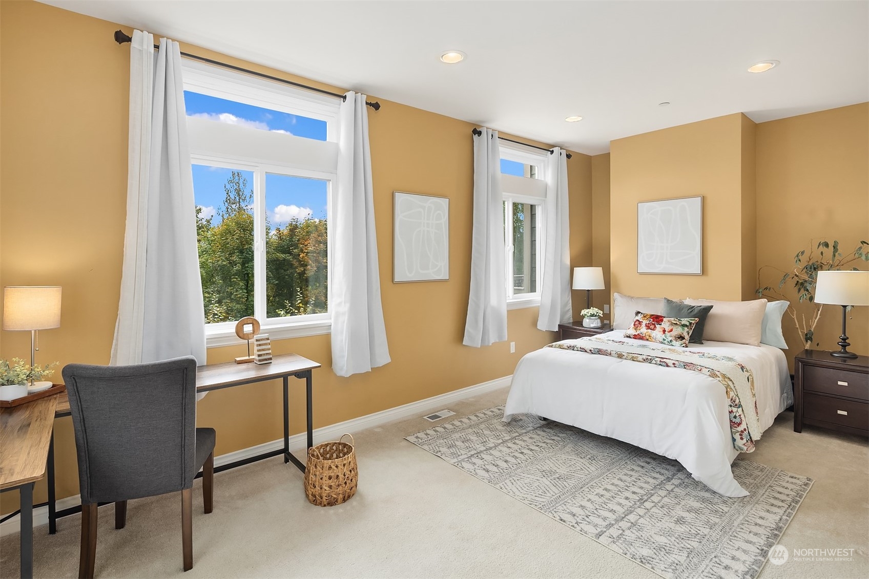 32255 Northeast 88th Street Carnation, WA 98014 - Photo 5 of 40 a spacious bedroom with a bed and a table