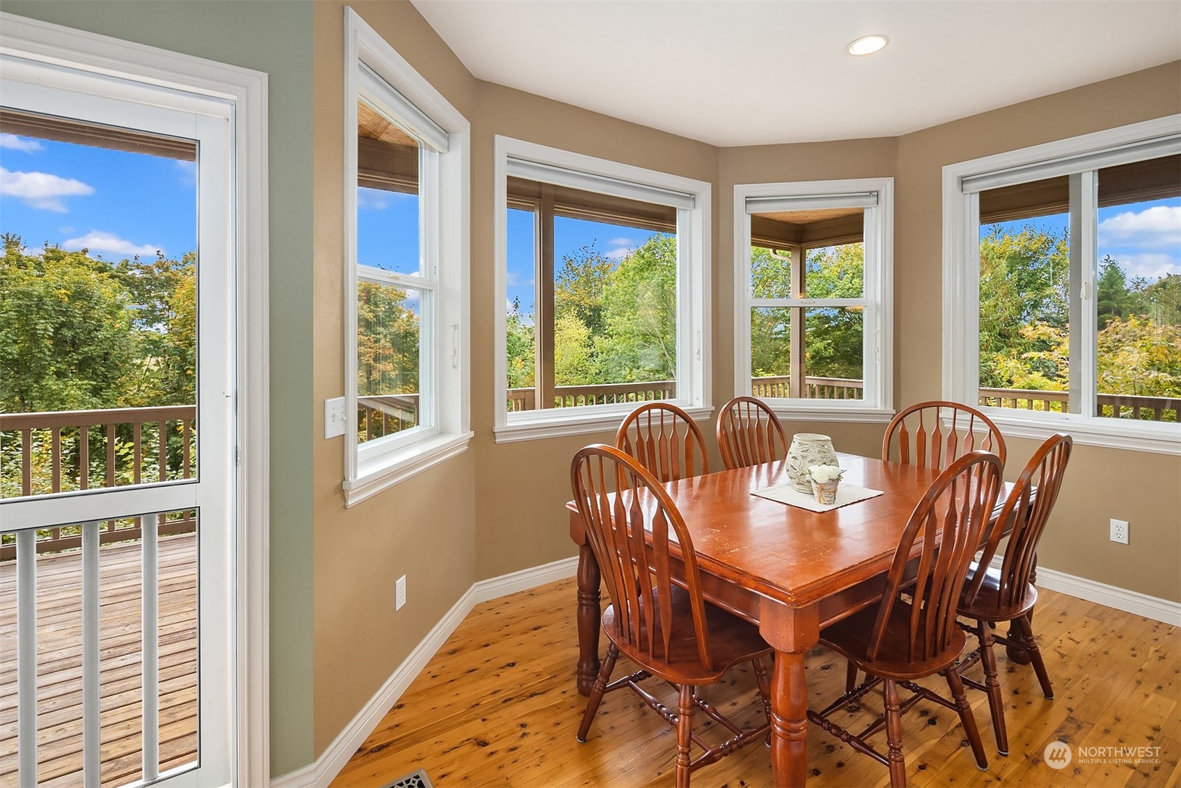 32255 Northeast 88th Street Carnation, WA 98014 - Photo 8 of 40 a view of a dining room with furniture window and outside view