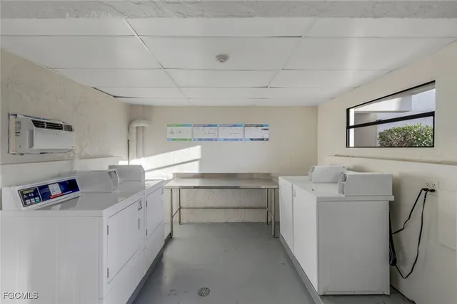 a view of cabinets and washer dryer
