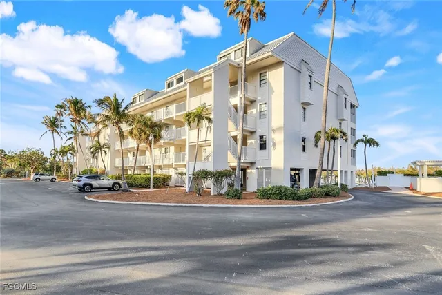 a large building with a street sign on it
