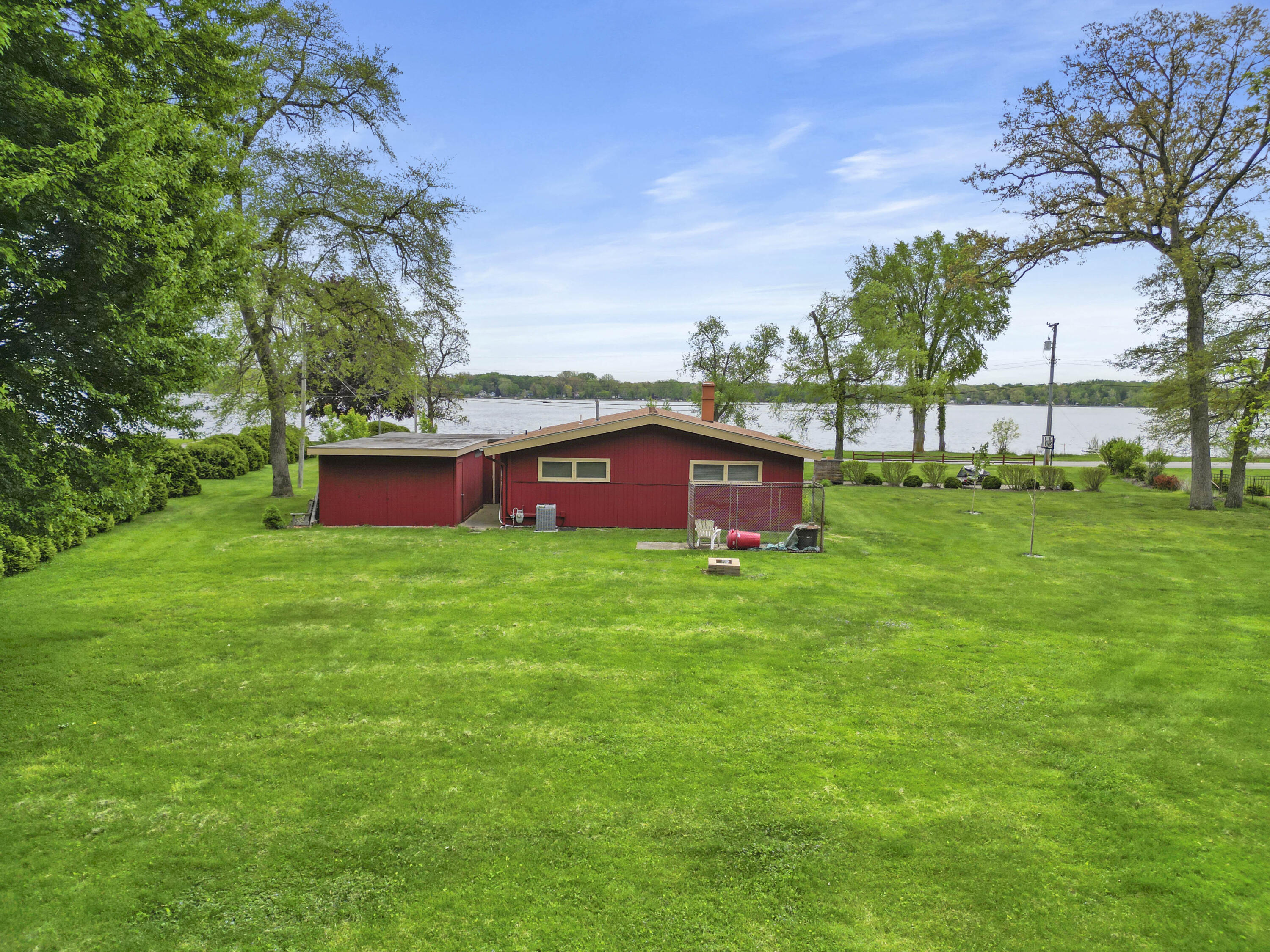 5100 South County Road 210 Knox, IN 46534 - Photo 5 of 14 a view of a yard with a big yard