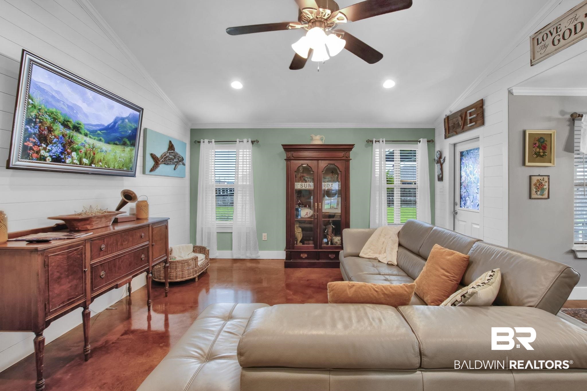 203 Lakefront Circle Summerdale, AL 36580 - Photo 14 of 69 Living room featuring ceiling fan, lofted ceiling, ornamental molding, and a wealth of natural light