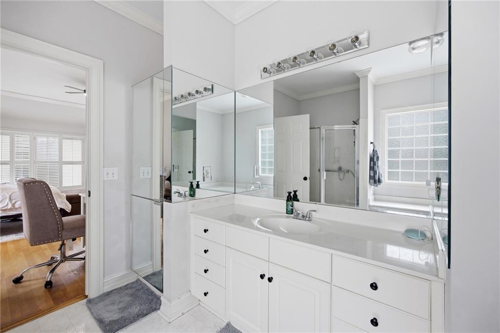 7387 Milam Road Winston, GA 30187 - Photo 27 of 41 a bathroom with a double vanity sink mirror and double
