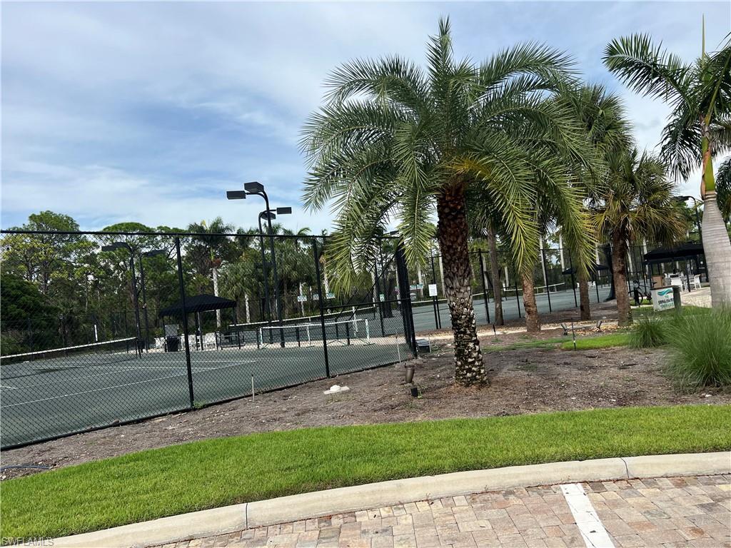 265 Indies Way, Unit 701 Naples, FL 34110 - Photo 36 of 36 a park with lots of palm trees and plants